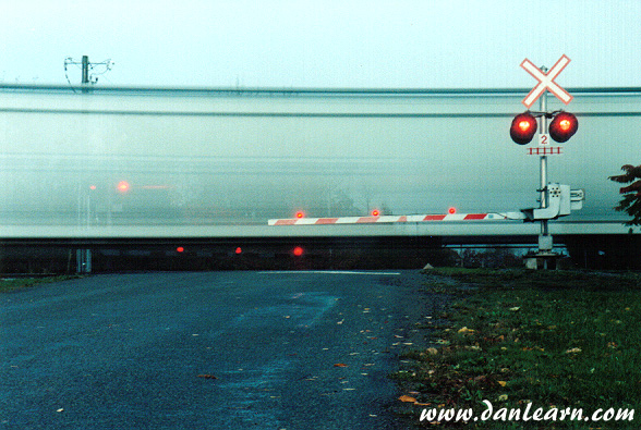 Train at grade crossing