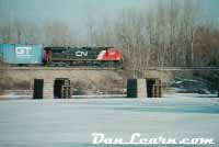 CN train passing Welland River